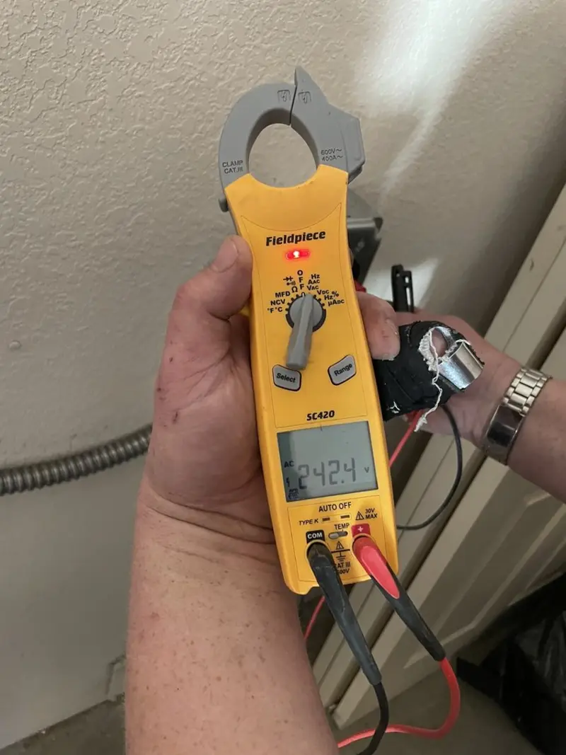 Voltage testing with clamp meter during Generator Installation in Merrill